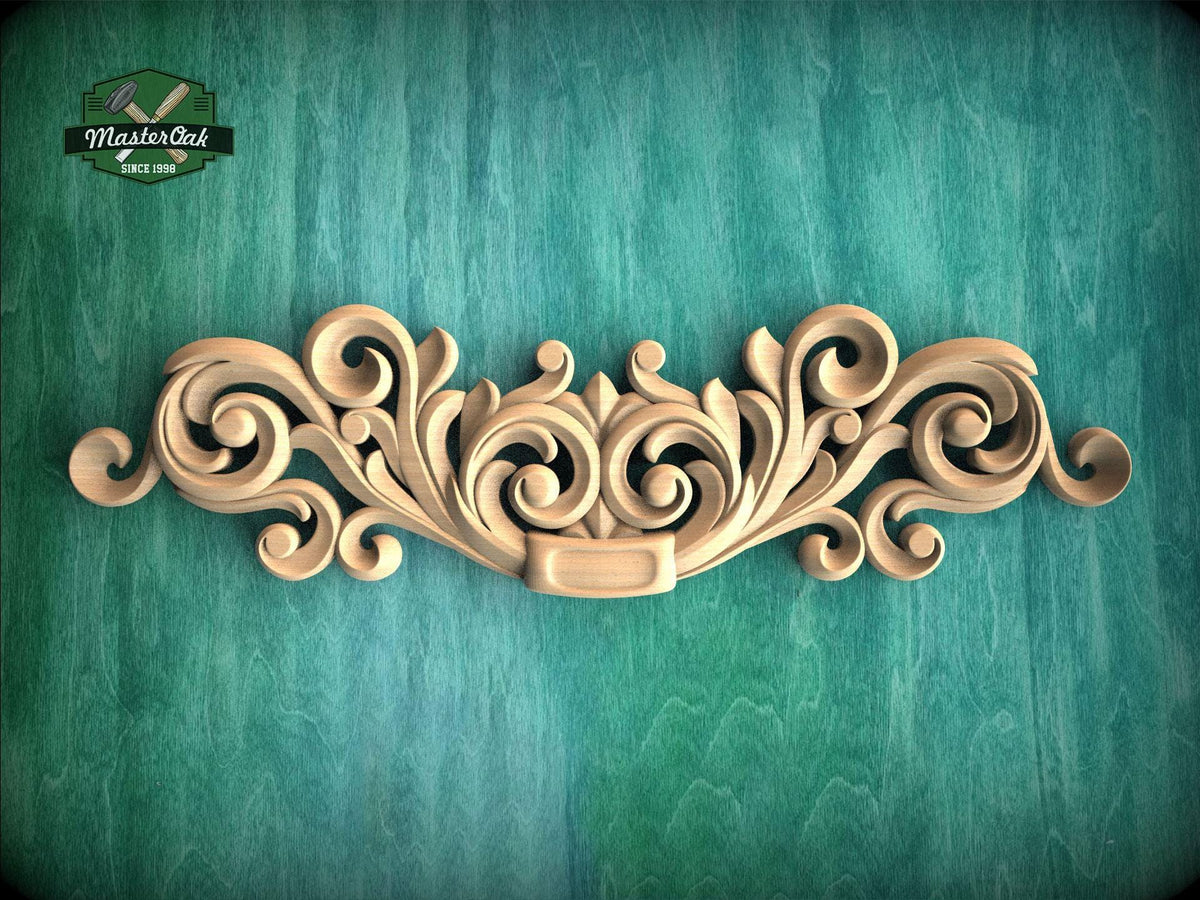 a wooden carving of a scroll on a green background