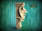 A carved wooden lion's head with an open mouth, displayed against a green background with a logo for Master Oak since 1989.