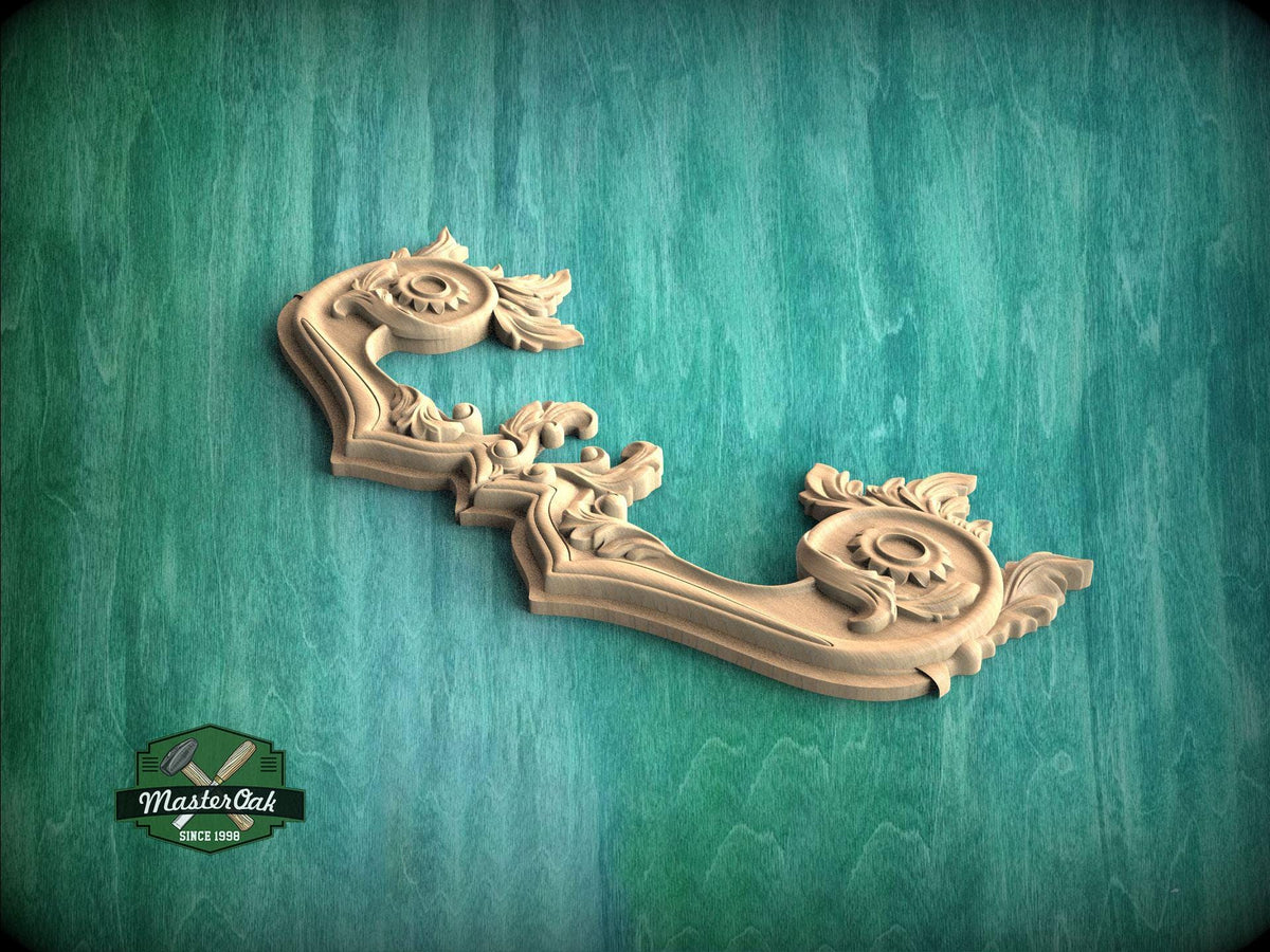 A decorative wooden carving or mold is displayed against a green textured background.