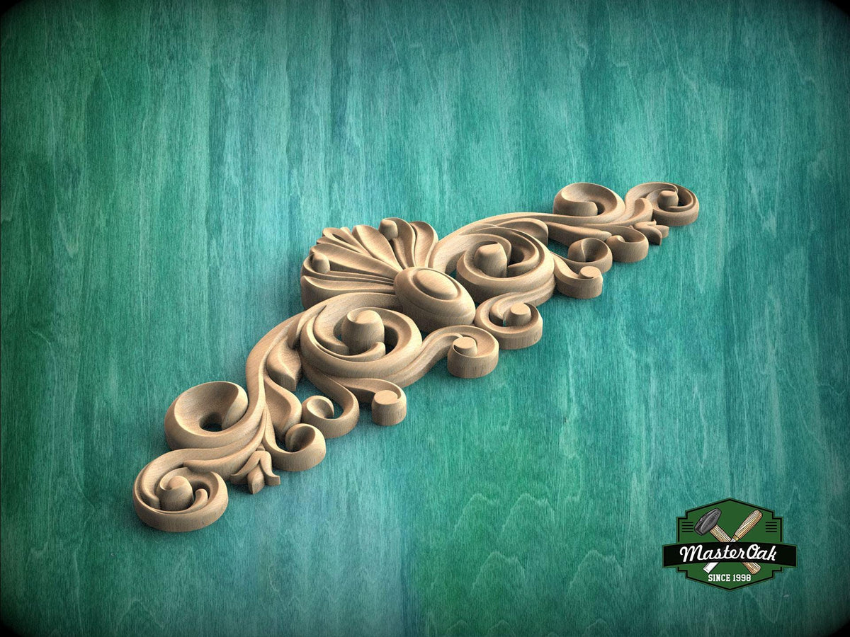 A decorative wooden carving with intricate scrollwork is displayed against a green background.
