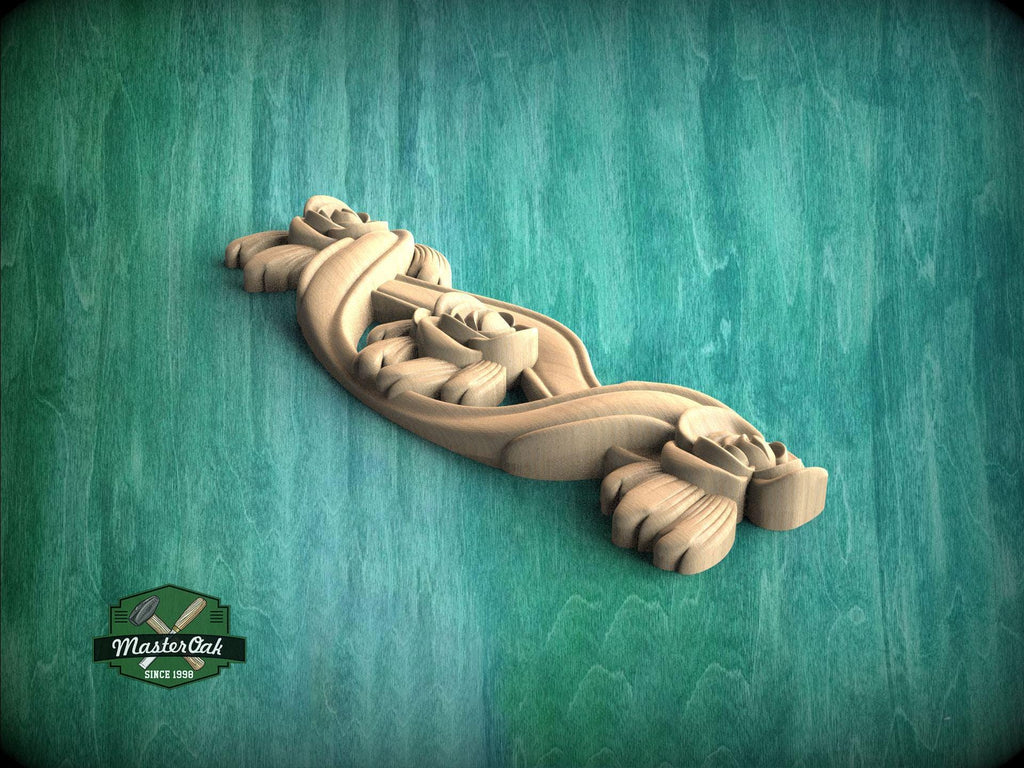 A wooden carving of a stylized flower or plant is displayed against a green background.