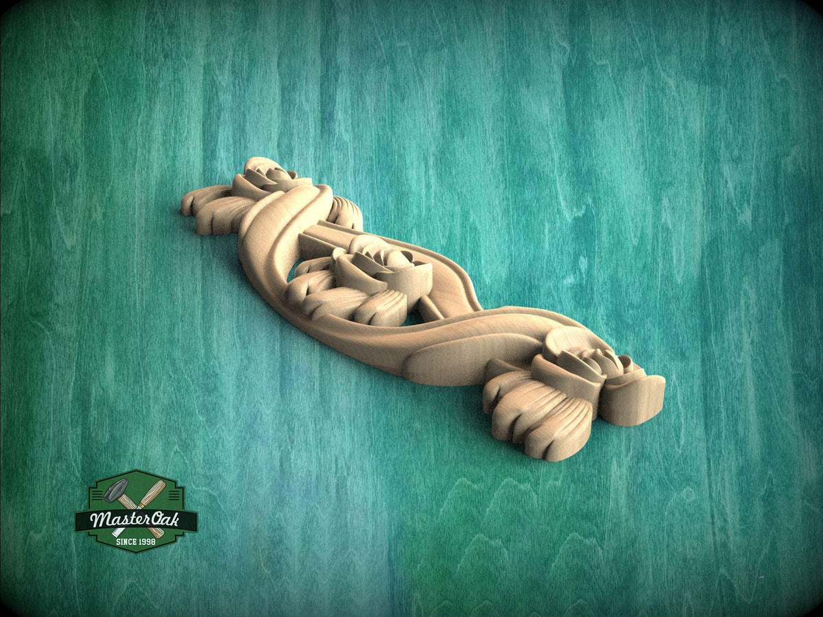 A wooden carving of a stylized flower or plant is displayed against a green background.