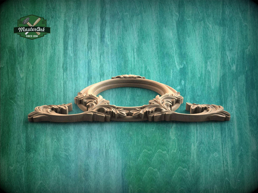 a wooden ornate frame with intricate carvings, displayed against a green textured background.