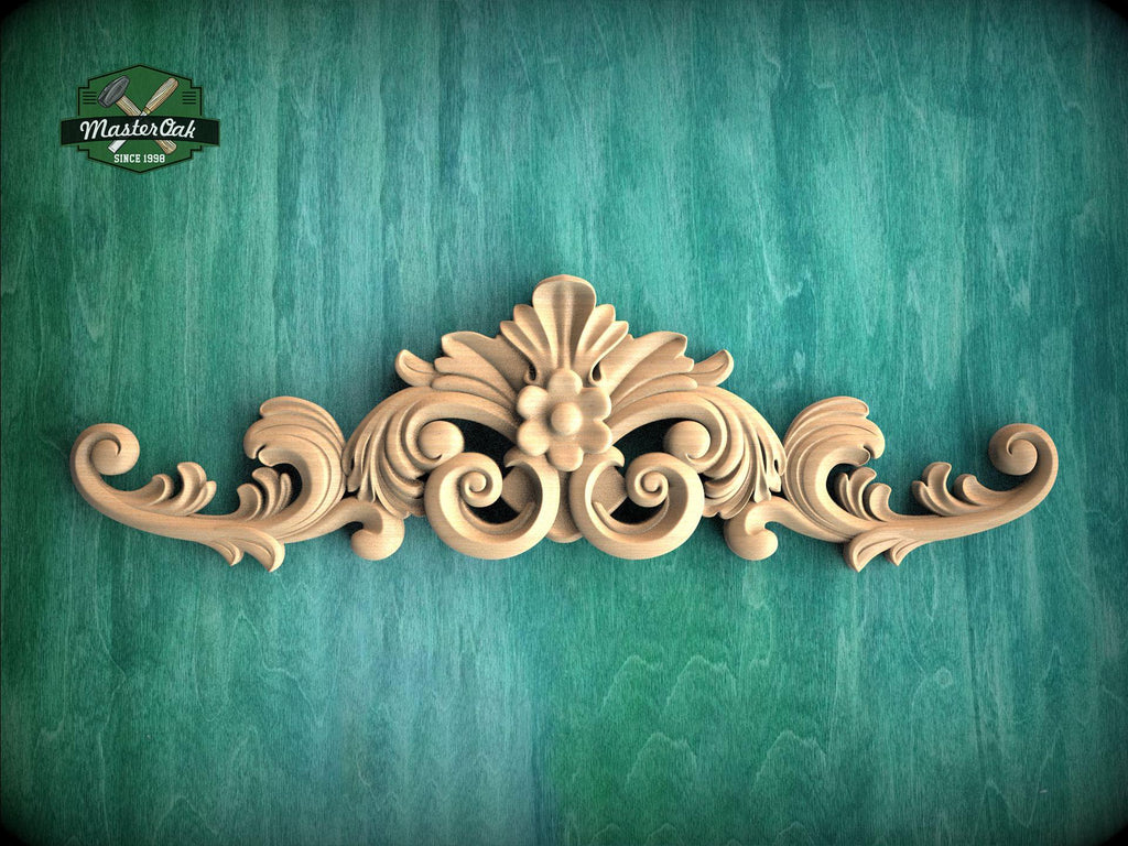 a decorative wooden carving on a green background.
