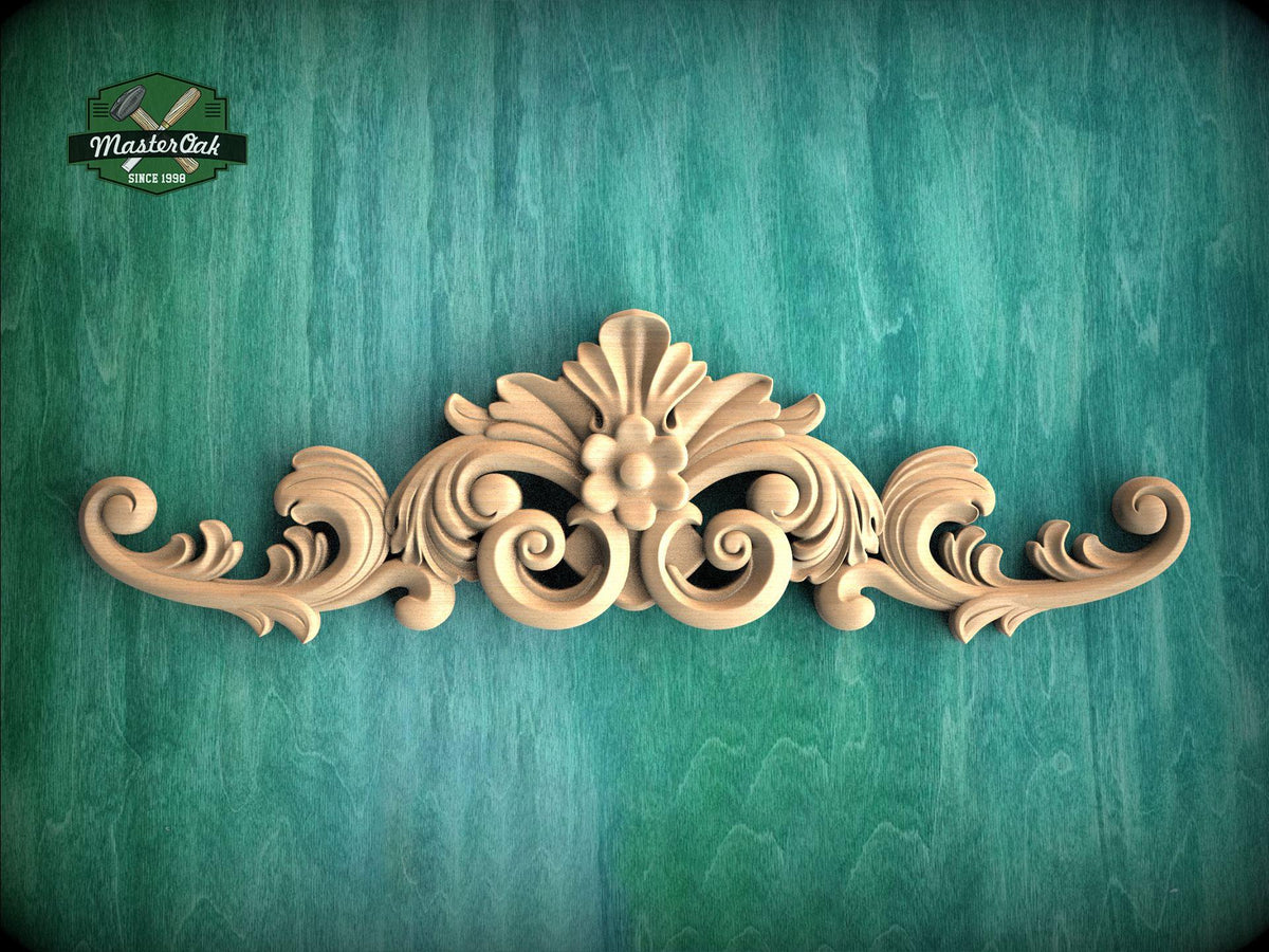 a decorative wooden carving on a green background.