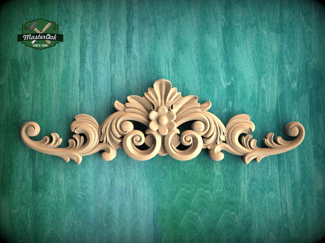 a decorative wooden carving on a green background.