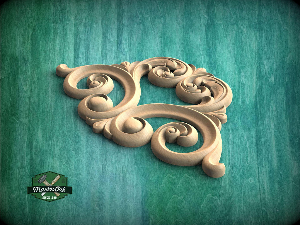 A decorative wooden carving in the shape of a swirl or scroll is displayed against a teal-colored background.