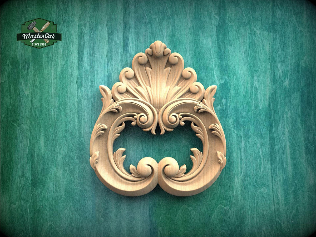 an ornate, carved wooden piece with intricate scrollwork and floral designs, set against a green textured background.
