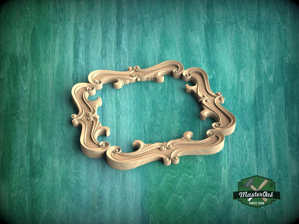 A wooden ornate frame with intricate scrollwork is displayed against a green textured background.