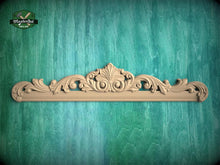 Load image into Gallery viewer, a decorative wooden panel with an ornate design, displayed against a green textured background.
