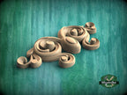 a group of wooden objects sitting on top of a green surface