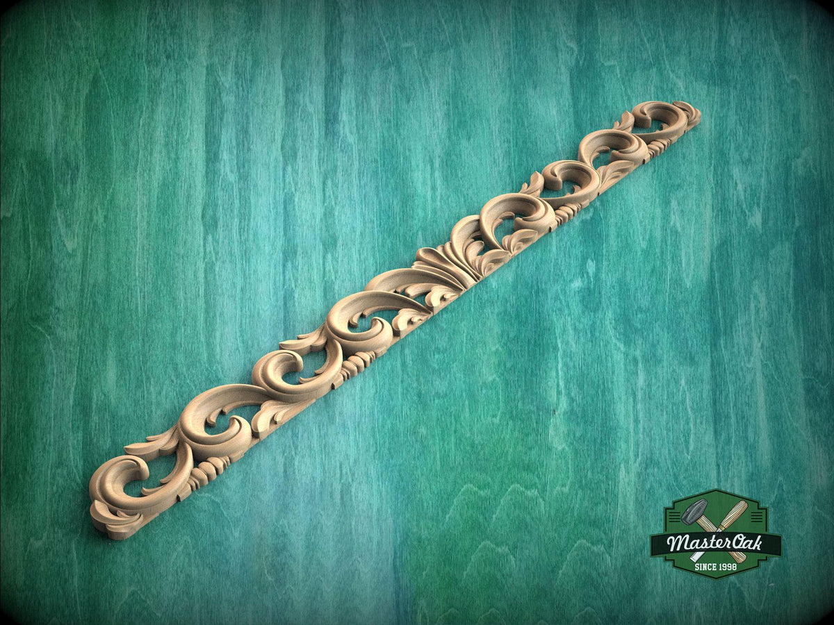 a decorative wooden object on a green background