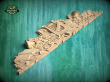 Load image into Gallery viewer, A 3D rendering of a wooden carving depicting a harp and other musical instruments, set against a green background.
