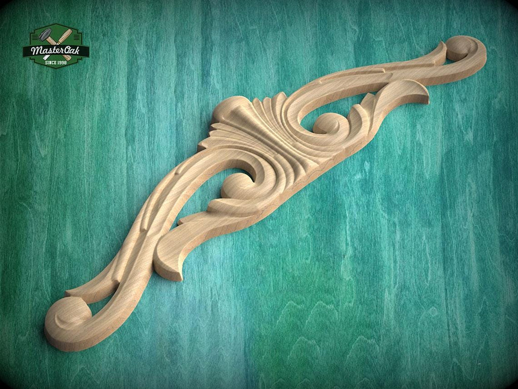 A wooden carving with an intricate, decorative design is displayed against a green background.
