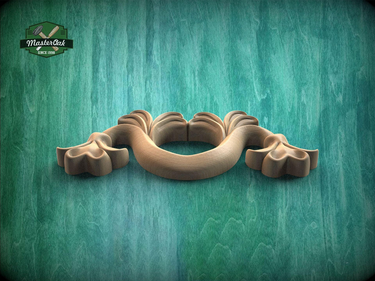 A wooden carving of a stylized flower or plant is displayed against a green textured background.
