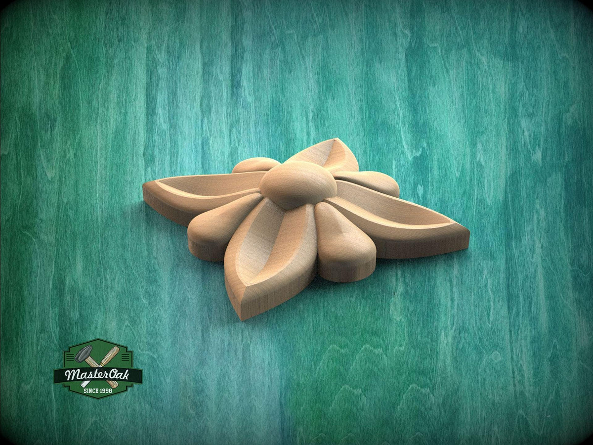A wooden flower-shaped object is displayed against a green background.
