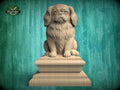 Carved wooden Pekingese dog finial sitting on decorative base, designed as a post topper for fence, deck or stair posts.