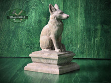 Load image into Gallery viewer, Wood carved fox newel post finial sculpture, natural wood animal statue sitting on a decorative pedestal, displayed on a green wood background

