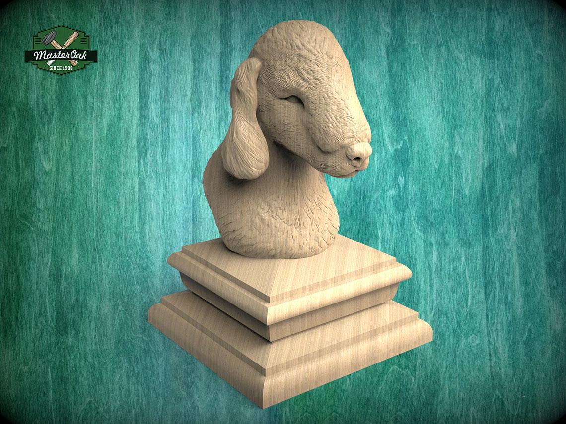 A wooden bust of a sheep's head is displayed on a wooden pedestal against a teal background.