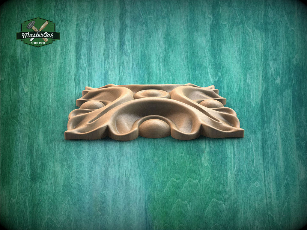 A wooden carving or sculpture is displayed against a green background.
