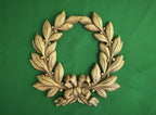 Laurel wreath of wood, bays carved in wood, wreath on the wall